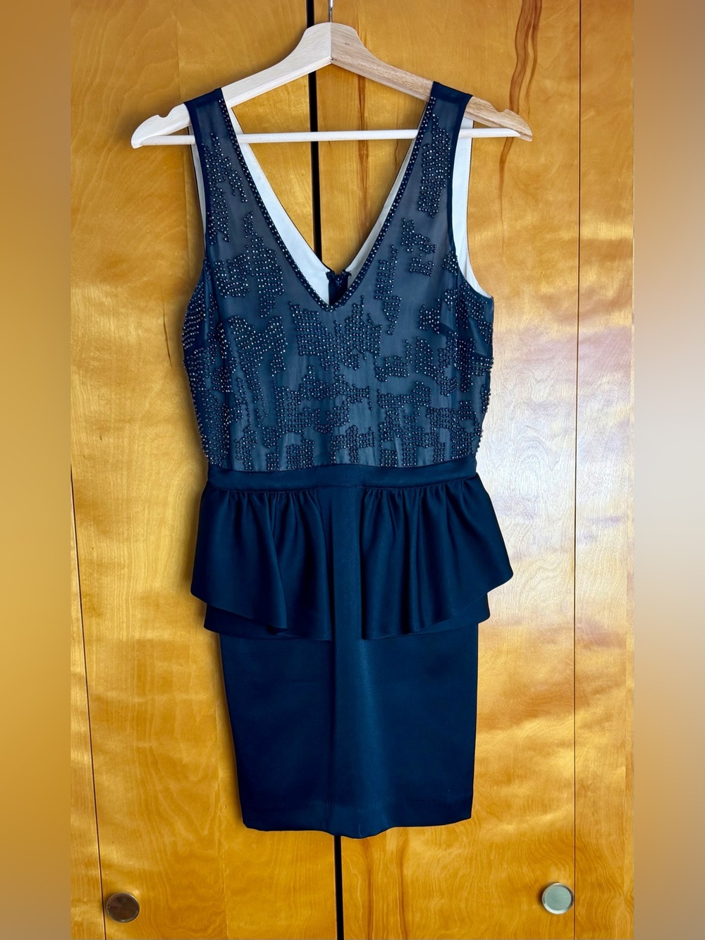 Black Sleeveless Peplum Evening Dress with Beaded Bodice